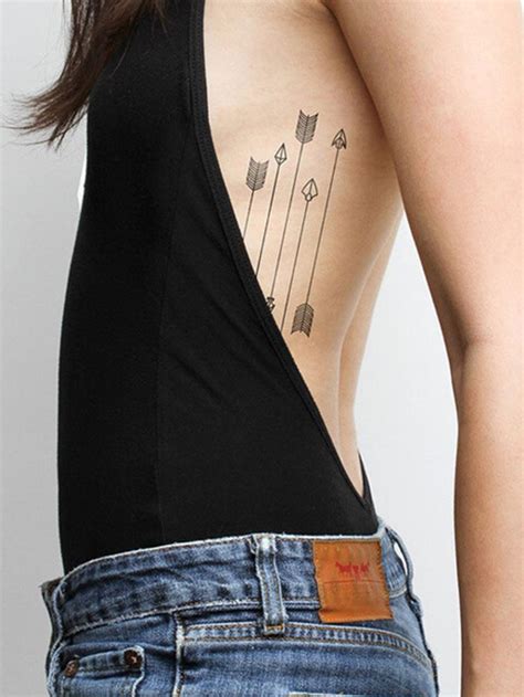 back rib tattoo|beautiful rib tattoos for women.